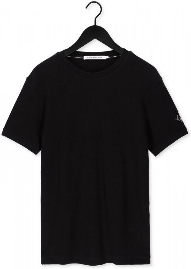Calvin Klein Zwarte T-shirt Monogram Badge Waffle Ss Tee