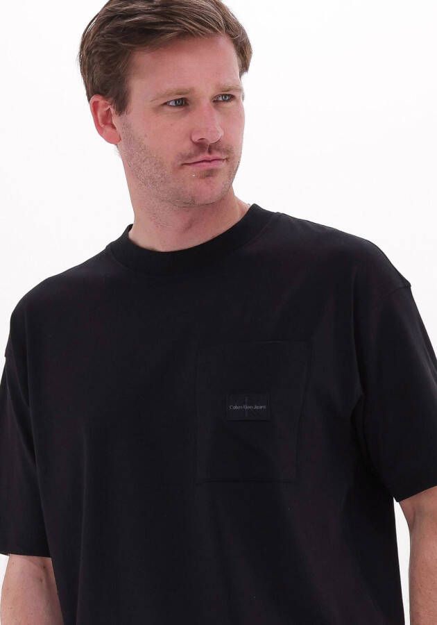 CALVIN KLEIN Heren Polo's & T-shirts Shrunken Badge Pocket Tee Zwart