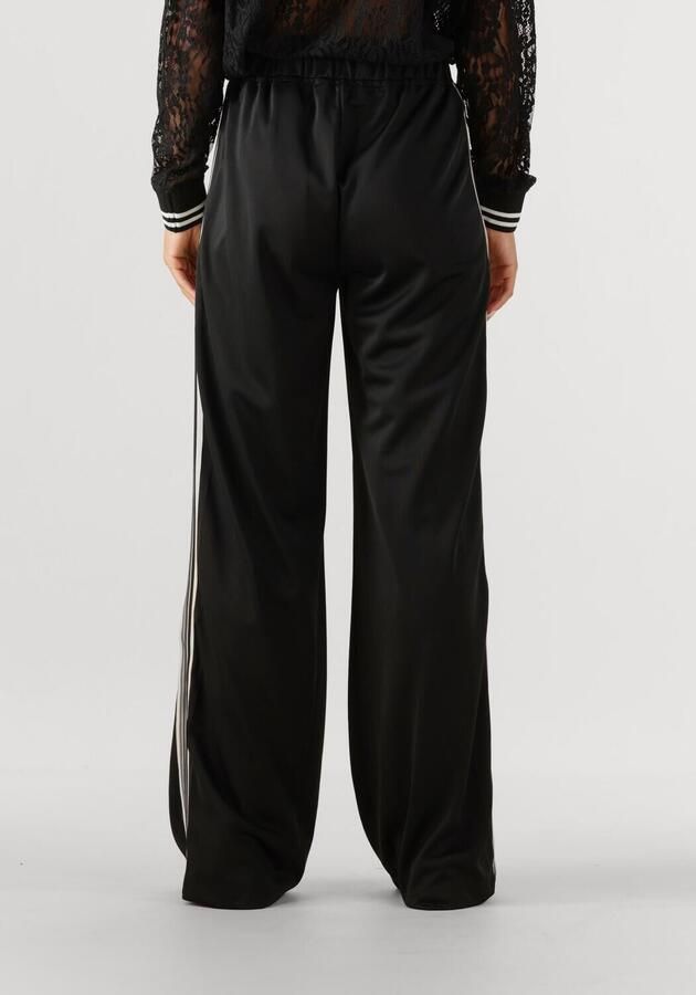 HAUTE L'AMITIÉ Haute L'Amitié Dames Broeken Baggy Days Track Tall Pant Zwart