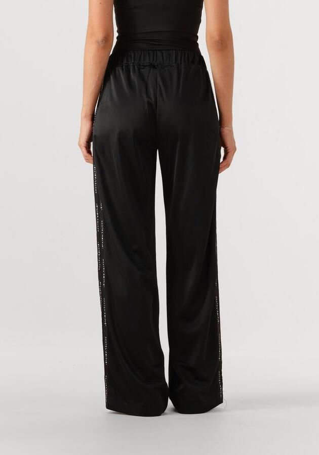HAUTE L'AMITIÉ Haute L'Amitié Dames Broeken Logo Tape Track Tall Pant Zwart