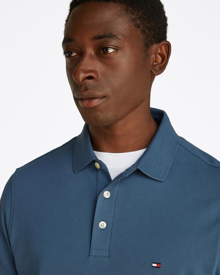 Tommy Hilfiger Poloshirt 1985 SLIM POLO met piquéstructuur en borduursel gemêleerd casual slim fit katoenmix polokraag