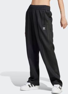 Adidas Originals Zwarte sportieve broek Eigentijdse twist Oversized pasvorm Zwart Dames