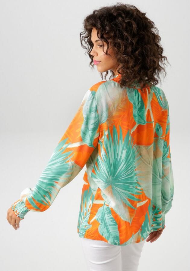Aniston CASUAL Blouse zonder sluiting met grootvlak bladerenprint in batikdesign - Foto 4