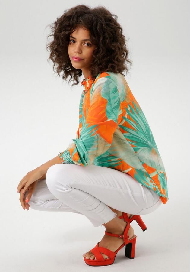 Aniston CASUAL Blouse zonder sluiting met grootvlak bladerenprint in batikdesign - Foto 6