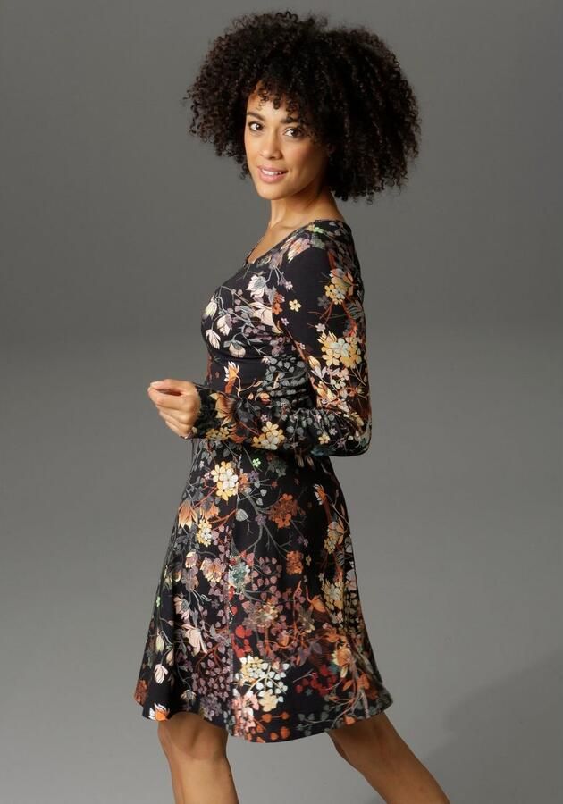 Aniston CASUAL Jerseyjurk met bloemenprint of in uni-zwart - Foto 2