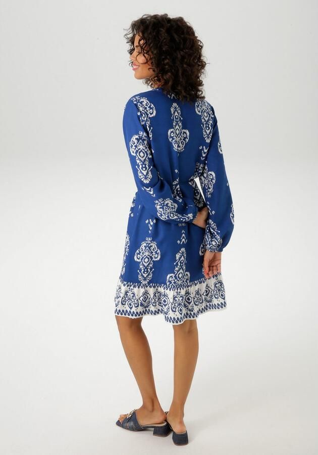 Aniston CASUAL Tuniekjurk met ornamentprint en contrasterende volant (Met afneembare koordbindband) - Foto 5