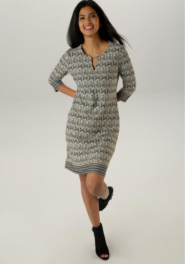 Aniston SELECTED Jerseyjurk met decoratieve cut-out bij de ronde hals - Foto 4