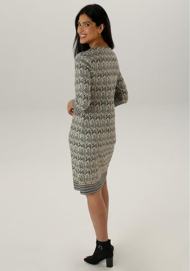 Aniston SELECTED Jerseyjurk met decoratieve cut-out bij de ronde hals - Foto 5