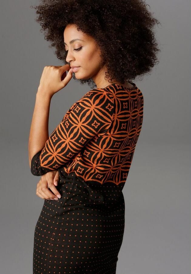 Aniston SELECTED Jerseyjurk met modern motief- en stippendesign - Foto 3