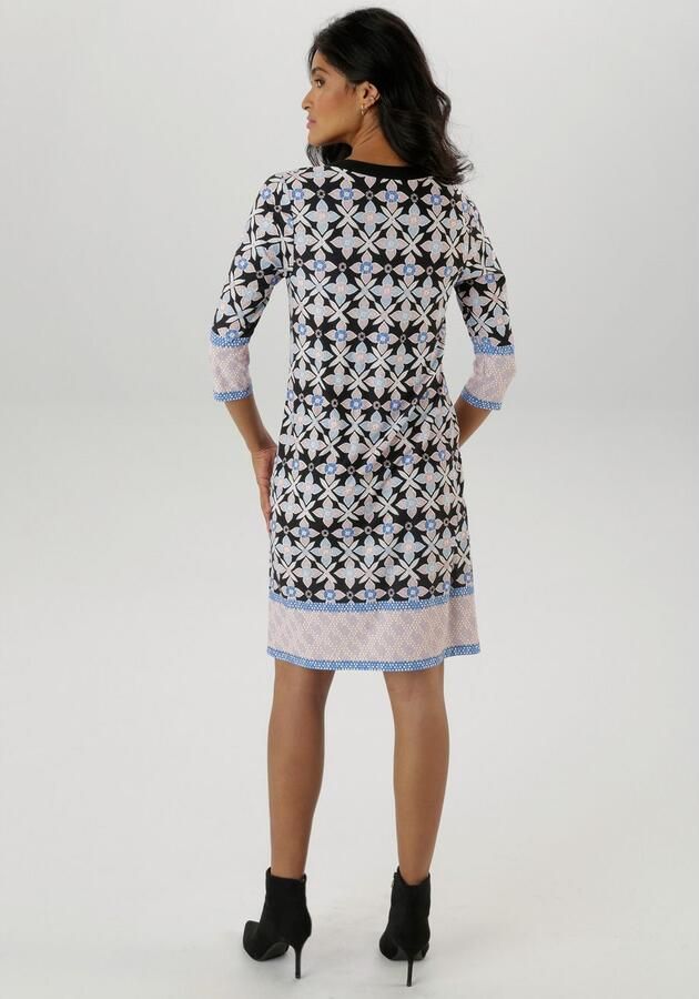 Aniston SELECTED Jerseyjurk met speelse bloemenrand - Foto 4