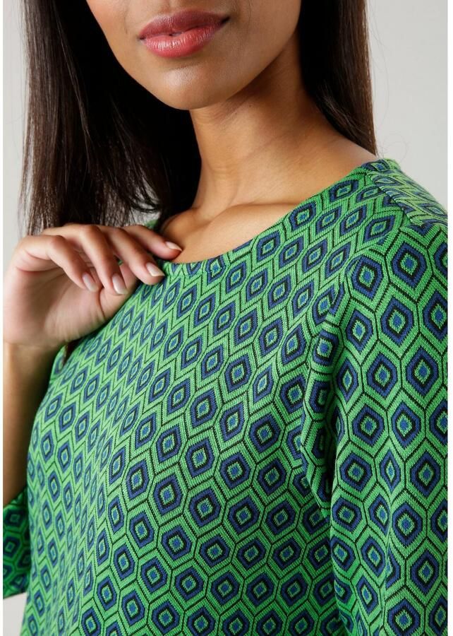 Aniston SELECTED Jerseyjurk met trendy retropatroon