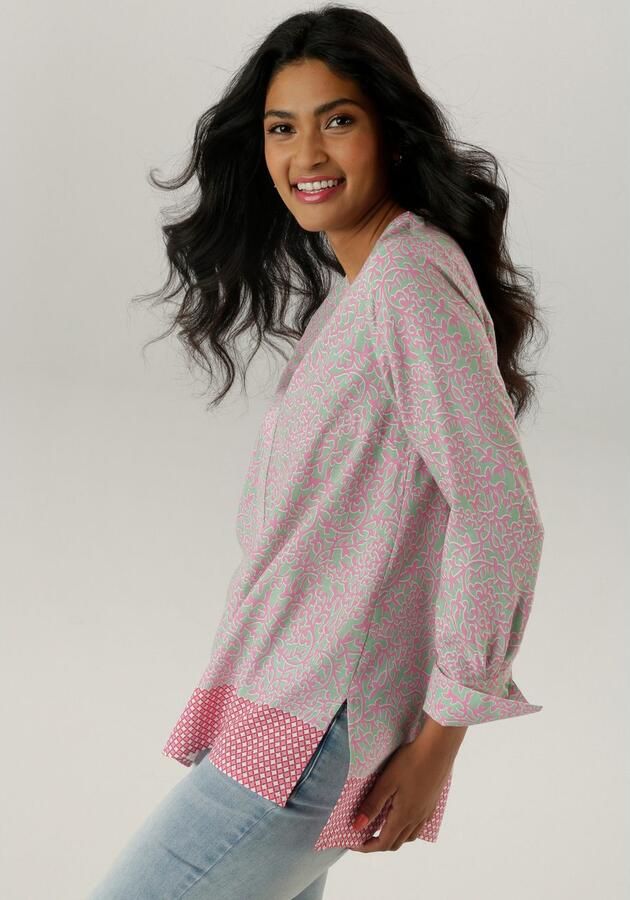 Aniston SELECTED Lange blouse met rankenpatroon en randprint aan de zoom - Foto 4