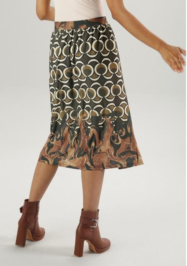 Aniston SELECTED Midirok in uni zwart of met nostalgische print - Foto 4