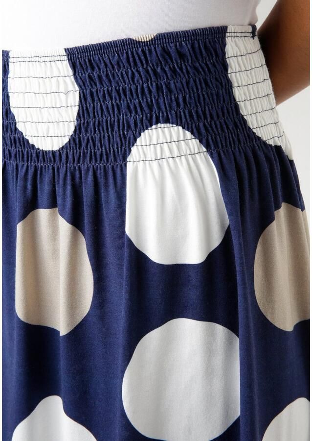 Aniston SELECTED Zomerrok met gesmokte tailleband en stippenprint - Foto 1