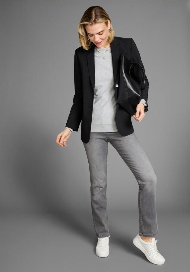 Laura Scott Trui met vleermuismouwen met sierknoopsluiting