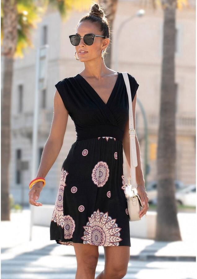 Beachtime Zomerjurk met uitsnede aan de achterkant jersey jurk in wikkeloptiek strandjurk - Foto 2