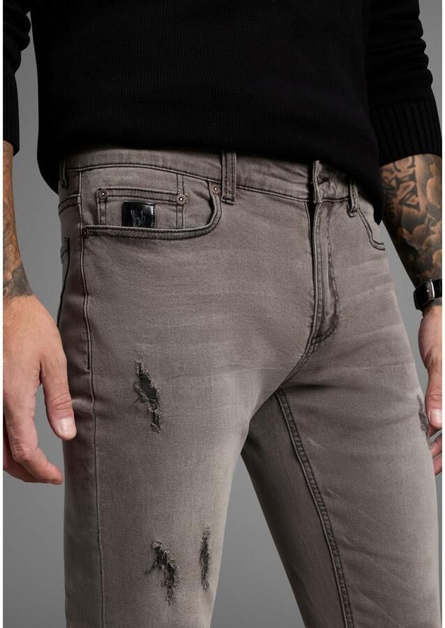 Bruno Banani Straight jeans Hutch rechte broekspijpen gedeeltelijk met modieuze destroyed-effecten