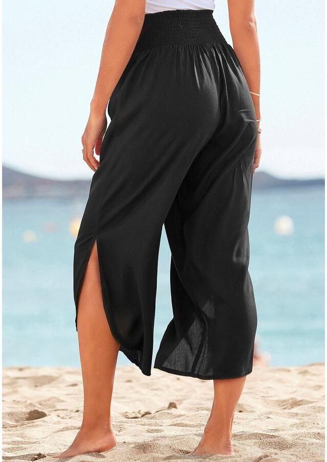 Buffalo Comfortbroek met comfortabele gesmokte tailleband en split bij de broekspijpen stoffen broek strandbroek