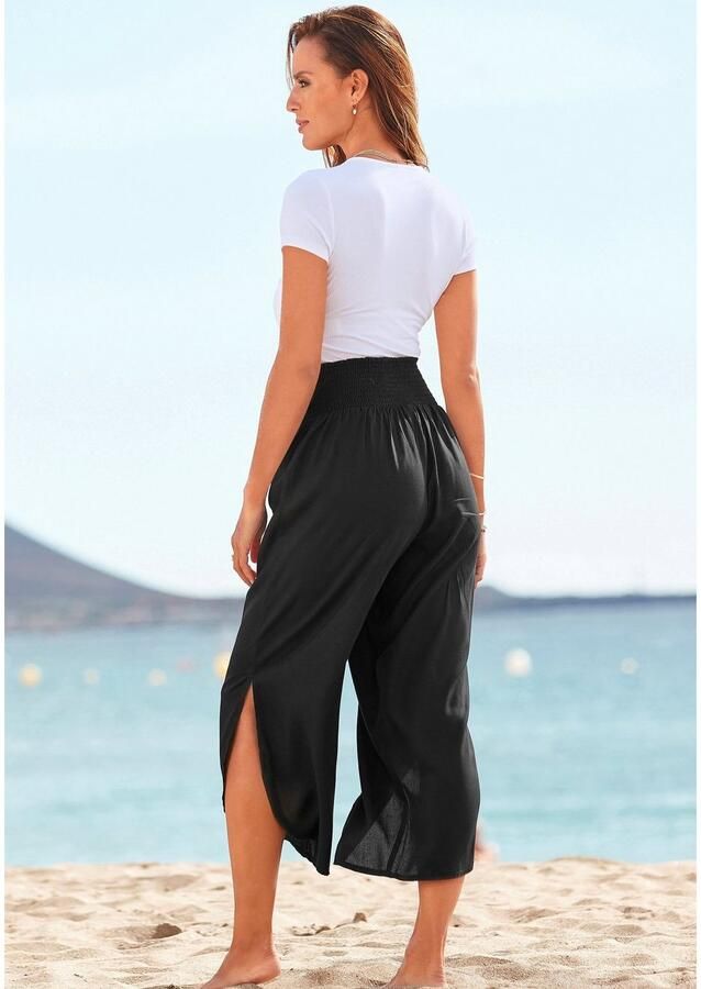 Buffalo Comfortbroek met comfortabele gesmokte tailleband en split bij de broekspijpen stoffen broek strandbroek - Foto 5