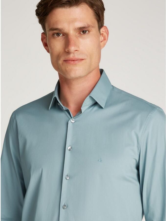 Calvin Klein Businessoverhemd POPLIN STRETCH SLIM SHIRT met kent-kraag logoprint op borsthoogte