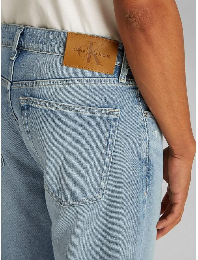 Calvin Klein Destroyed jeans SLIM TAPER in lichtblauwe wassing
