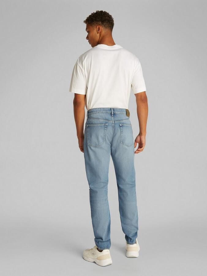 Calvin Klein Destroyed jeans SLIM TAPER in lichtblauwe wassing - Foto 3