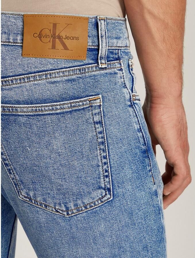 Calvin Klein Slim fit jeans SLIM TAPER Muntzakje logo borduursel