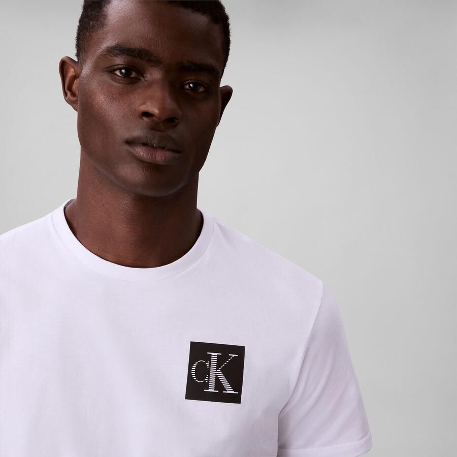 Calvin Klein Jeans Regular fit T-shirt van puur katoen met logoprint