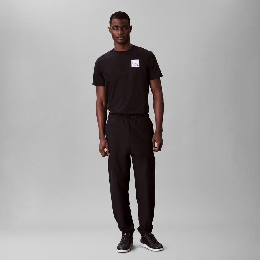 Calvin Klein Jeans Regular fit T-shirt van puur katoen met logoprint - Foto 2