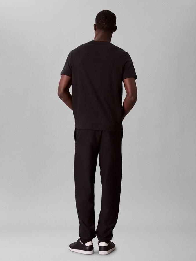 Calvin Klein Jeans Regular fit T-shirt van puur katoen met logoprint - Foto 6