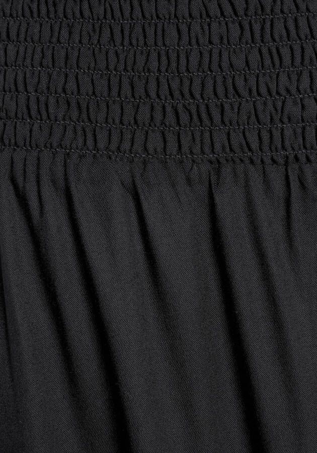 Buffalo Comfortbroek met comfortabele gesmokte tailleband en split bij de broekspijpen stoffen broek strandbroek