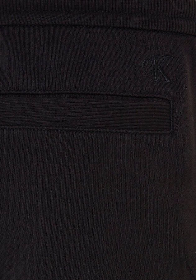 Calvin Klein Jogpants CK ADDRESS LOGO HWK PANT met logo op de pijp