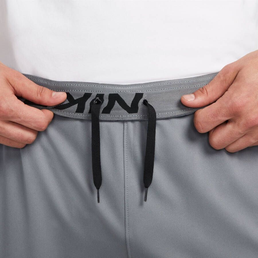 Nike Trainingsbroek DRI-FIT TOTALITY MEN'S TAPERED FITNESS PANTS
