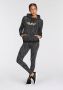 Puma essentials+ tiger all over print trui zwart grijs dames - Thumbnail 3