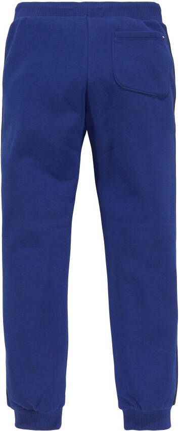 Tommy Hilfiger Sweatbroek GLOBAL STRIPES SWEATPANTS met colorblocking strepen aan de zijnaad