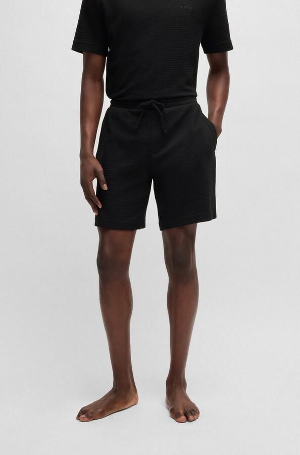 HUGO Regular fit sweatshorts met structuurmotief model 'Austin' - Foto 10