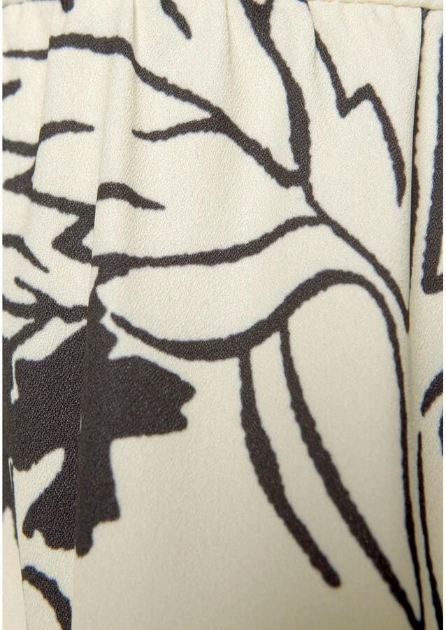 Lascana Blousejurk in wijd model met volants en bloemenprint tuniekjurk strandjurk