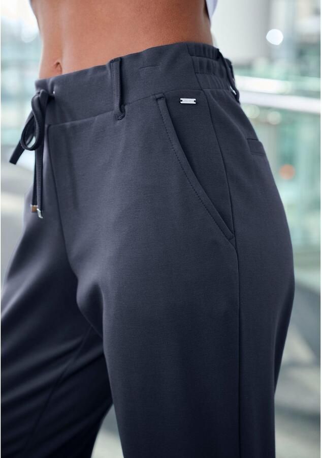 Lascana Jogpants met elastische tailleband en riemlussen loungewear (1-delig) - Foto 5