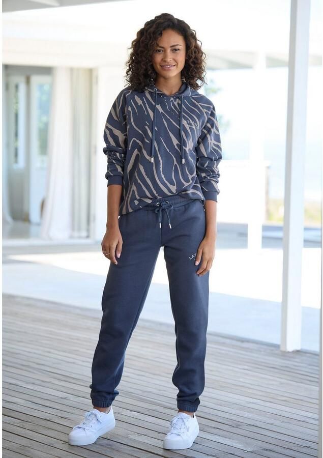 Lascana Sweatbroek Loungebroek Relaxbroek Loungebroek met zijzakken en logo-borduurwerk loungewear - Foto 3