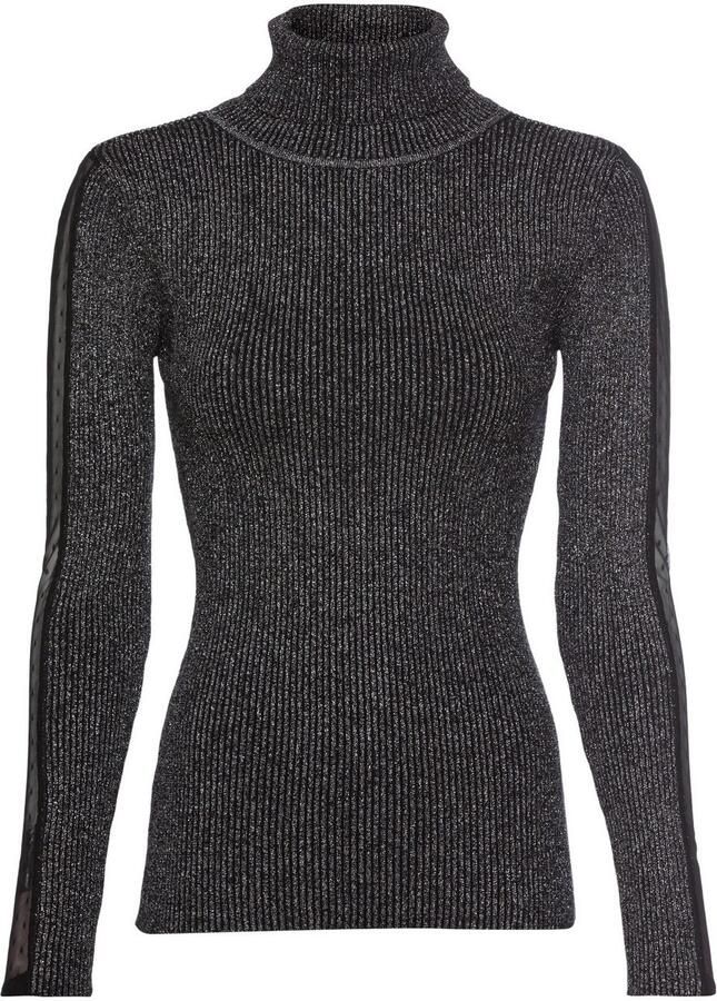 Laura Scott Coltrui met mesh-inzetstuk op de mouw van glinsterend lurex