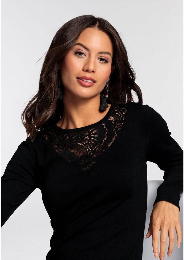 Laura Scott Gebreide jurk figuuraccentuerende snit met kantdetails