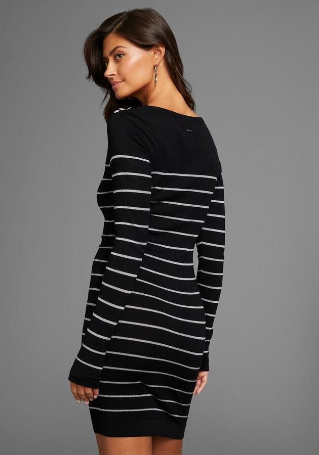 Laura Scott Gebreide jurk met glitters en schouderknopen