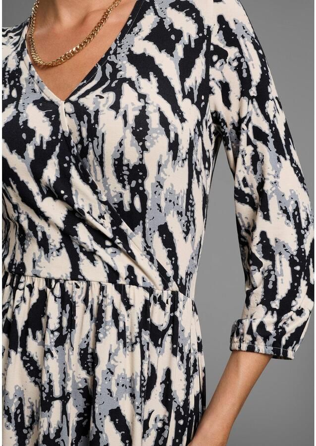 Laura Scott Jerseyjurk met modieus motief nieuwe collectie