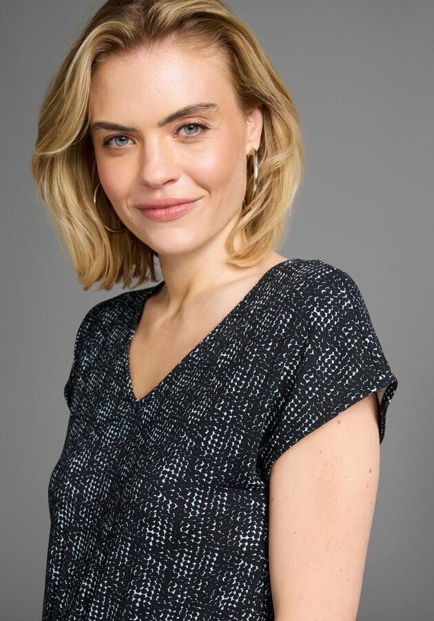 Laura Scott Jumpsuit met filigraan alloverprint