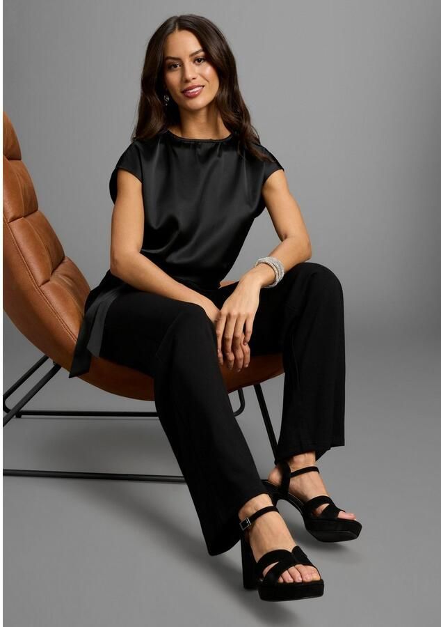 Laura Scott Jumpsuit van glanzend satijn met comfortabele jersey broek nieuwe collectie