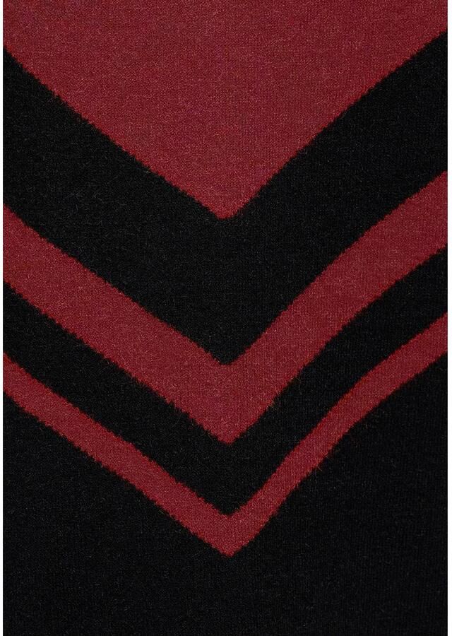 Laura Scott Lange trui met bijzonder breimotief