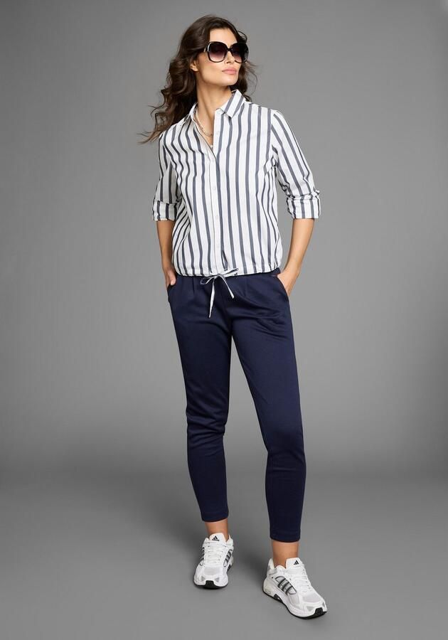 Laura Scott Zonnebril voor dames met subtiele siersteen op de beugel nieuw