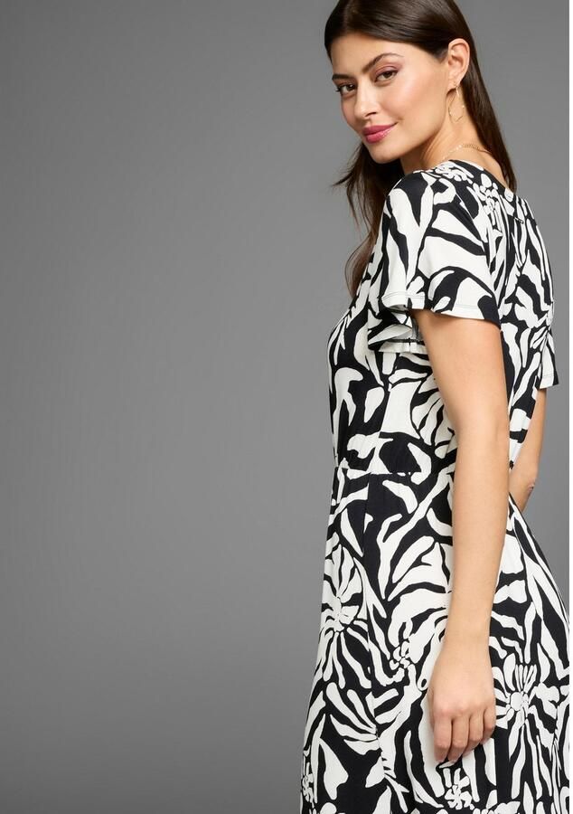 Laura Scott Zomerjurk in opvallende zebra-look met vleugelmouwen