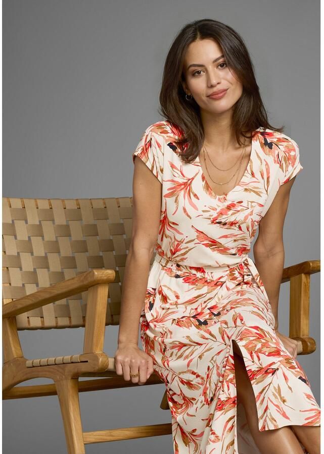 Laura Scott Zomerjurk met tropische allover print en bindband in de taille