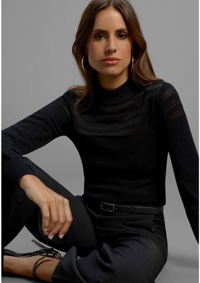 Melrose Trui met staande kraag met transparante strepen en ballonmouwen